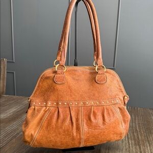 Innue distressed leather hobo shoulder bag made in Italy
